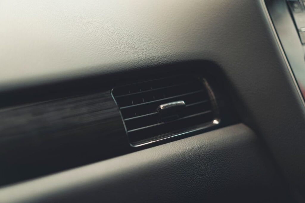 Detailed close up of a car dashboard air vent system